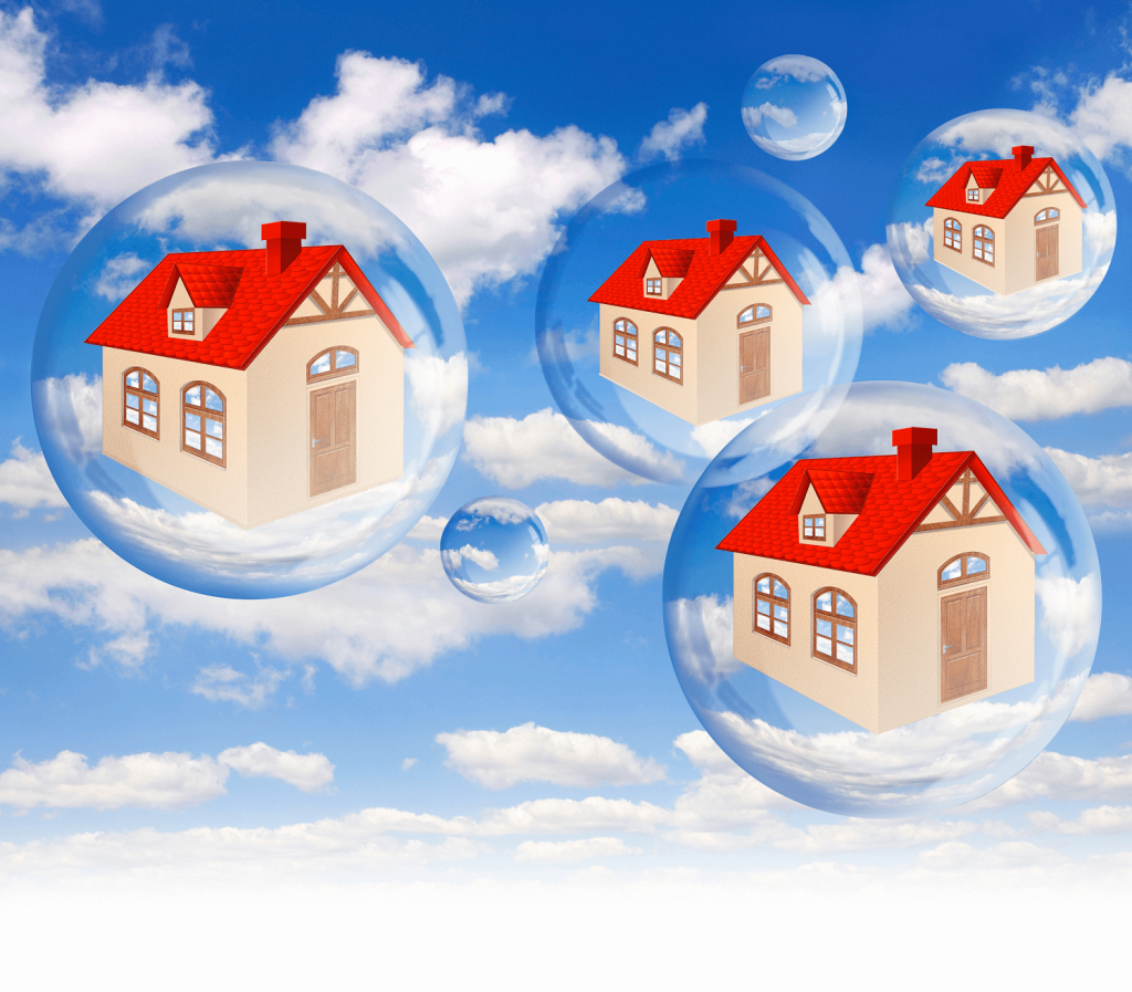 Homes in a bubble showing the uncertain market with mortgage rates raising